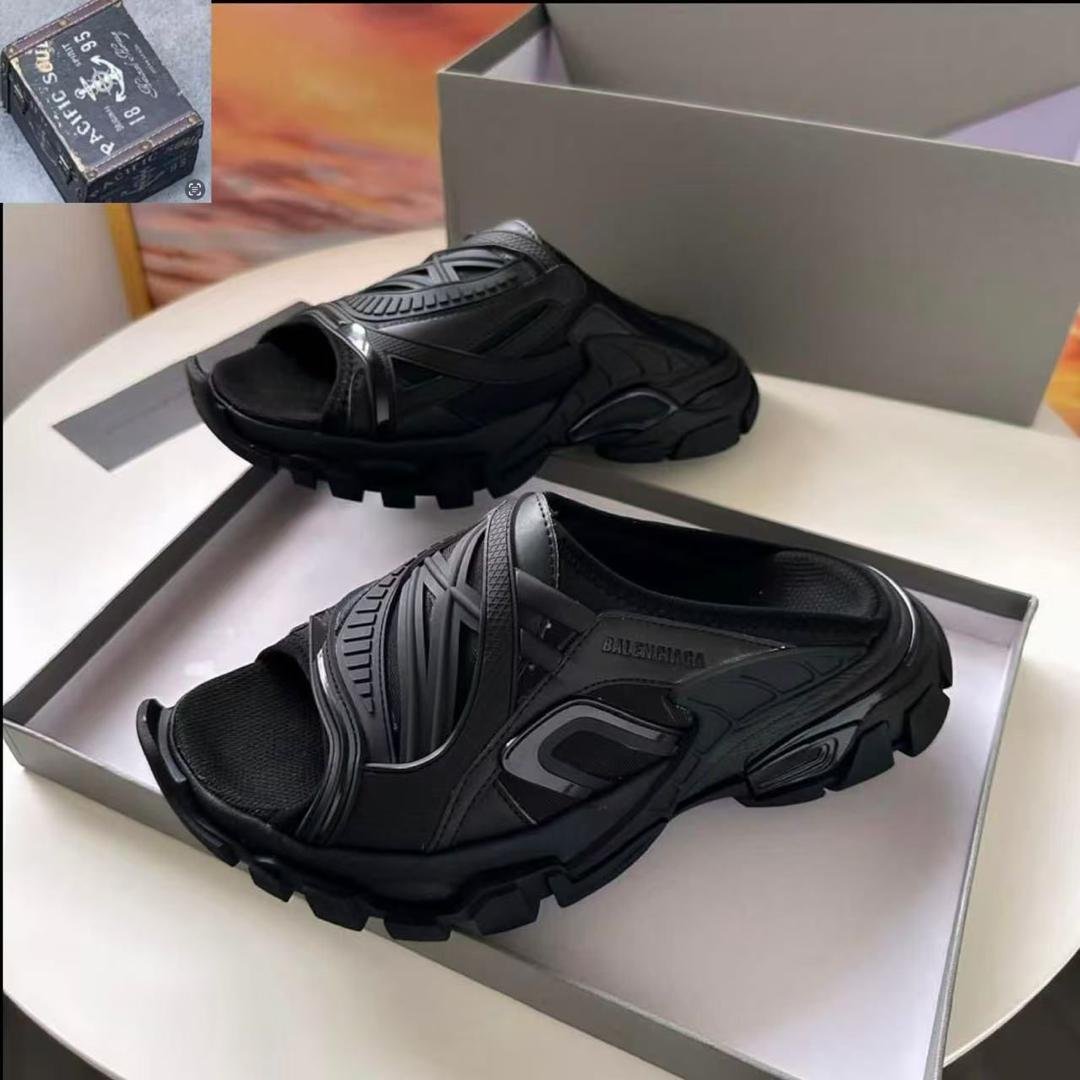 A pair of black BALENCIAGA sport sandals in a shoe box, perfect for comfortable and stylish footwear.