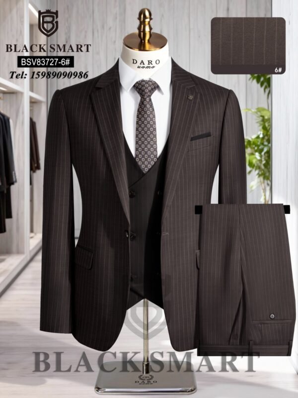IMG-20260613-WA0020 Brown pinstripe three-piece suit with matching trousers and tie on a mannequin.