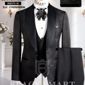 A mannequin wearing a black tuxedo suit with waistcoat and pocket square, perfect for formal events.
