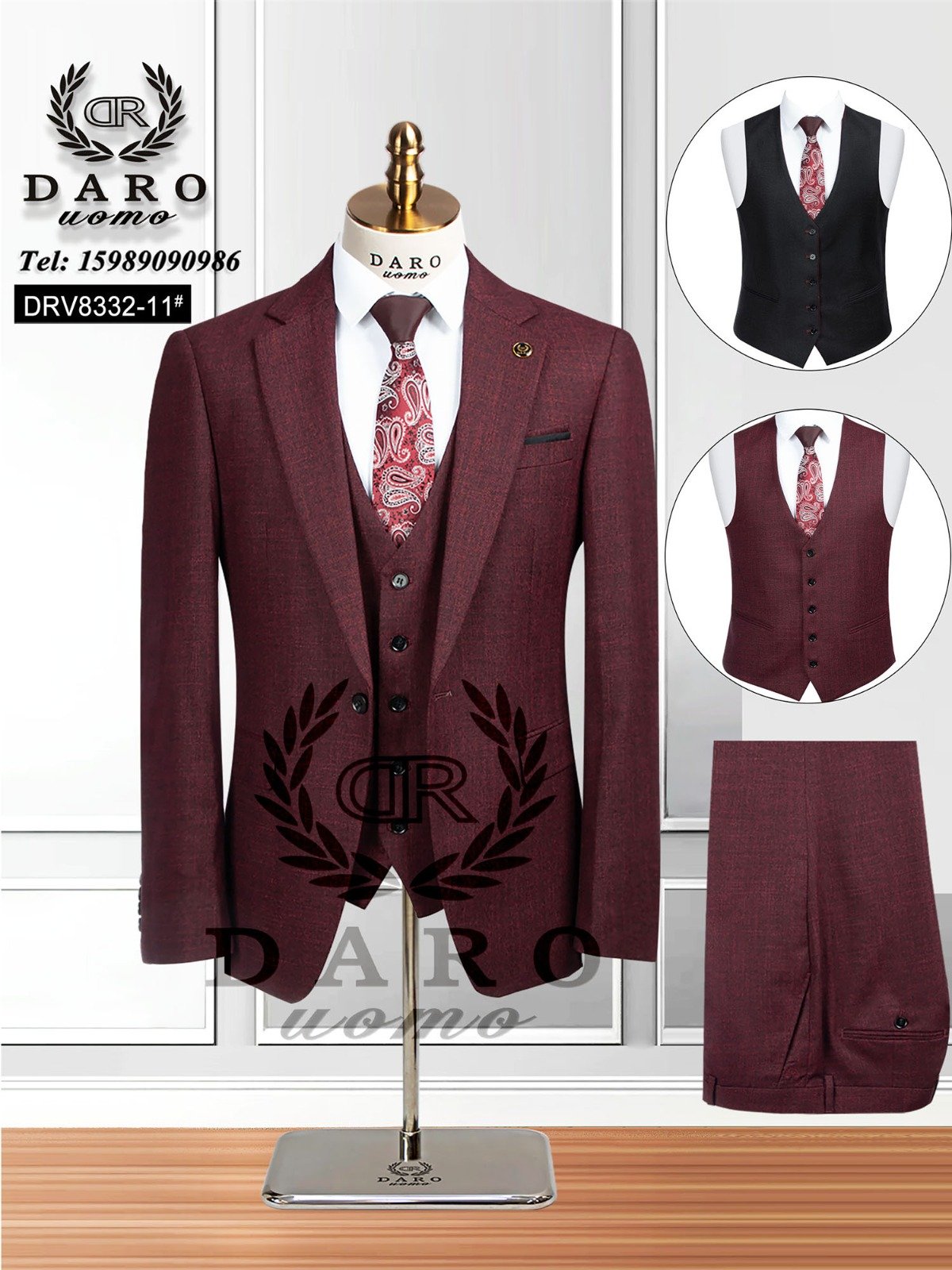 A mannequin wearing a maroon three-piece suit with a matching tie and vest options, showcasing the stylish and sophisticated design of the suit.