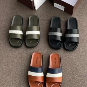A collection of Pedro brand colorful two-strap rubber sandals for men and women, displayed with shoe boxes on a brown surface.