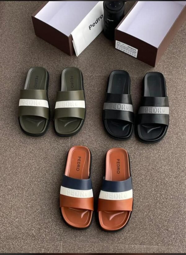 A collection of Pedro brand colorful two-strap rubber sandals for men and women, displayed with shoe boxes on a brown surface.